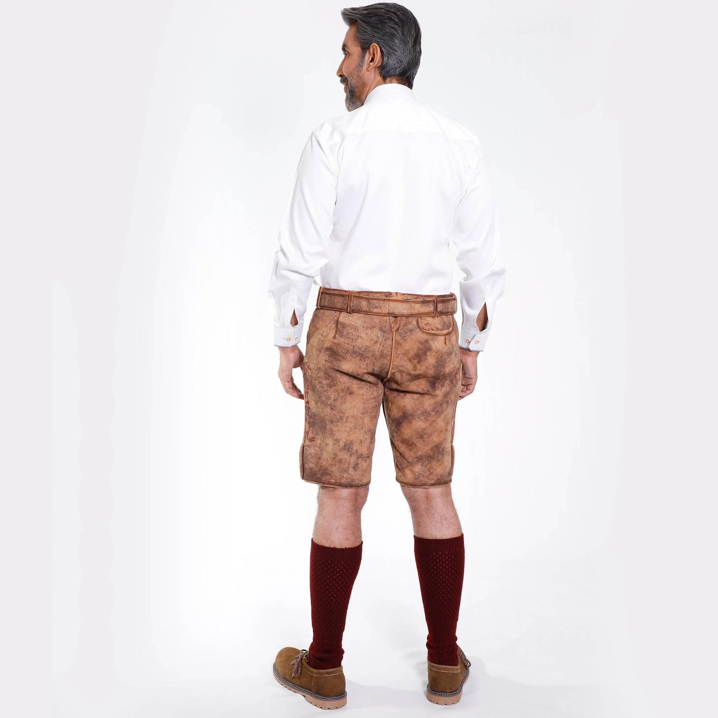 Brown leather short lederhosen back view with metal belt buckle and embroidered accents