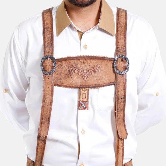 Leather suspender bib with decorative embossing and round rings, worn over white shirt