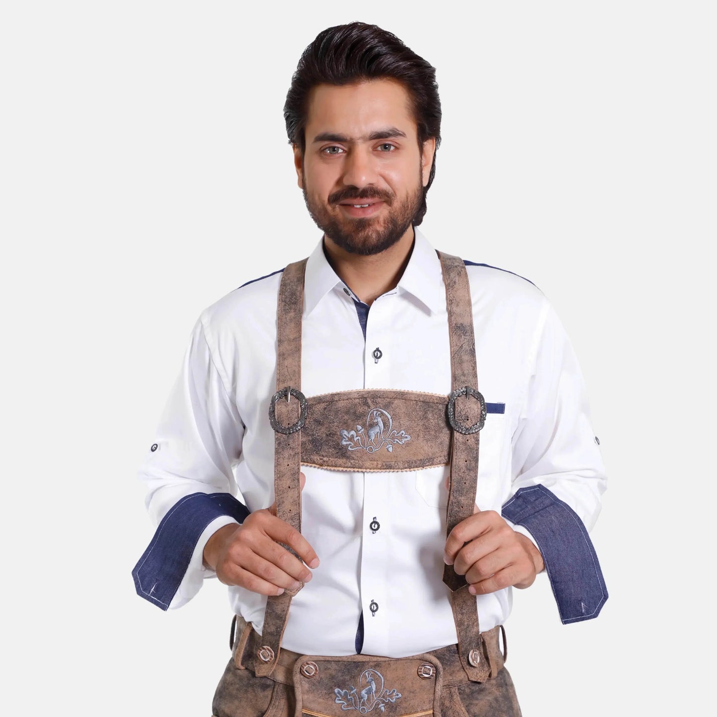 Brown leather lederhosen suspenders with embroidered band, worn with adjustable straps