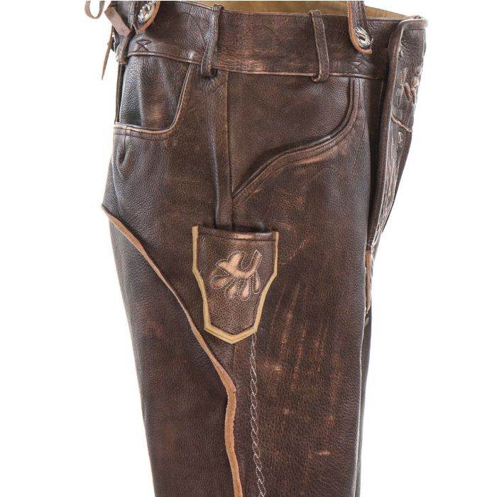 Close-up of men's alpine leather lederhosen front pocket and stitched emblem, dark brown