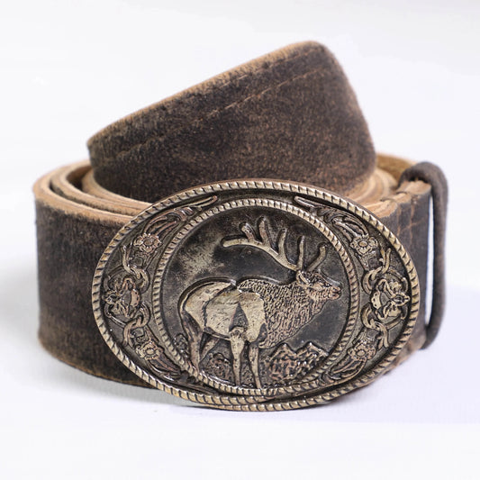 Men's dark-brown leather tracht belt, close-up ornate buckle with deer motif
