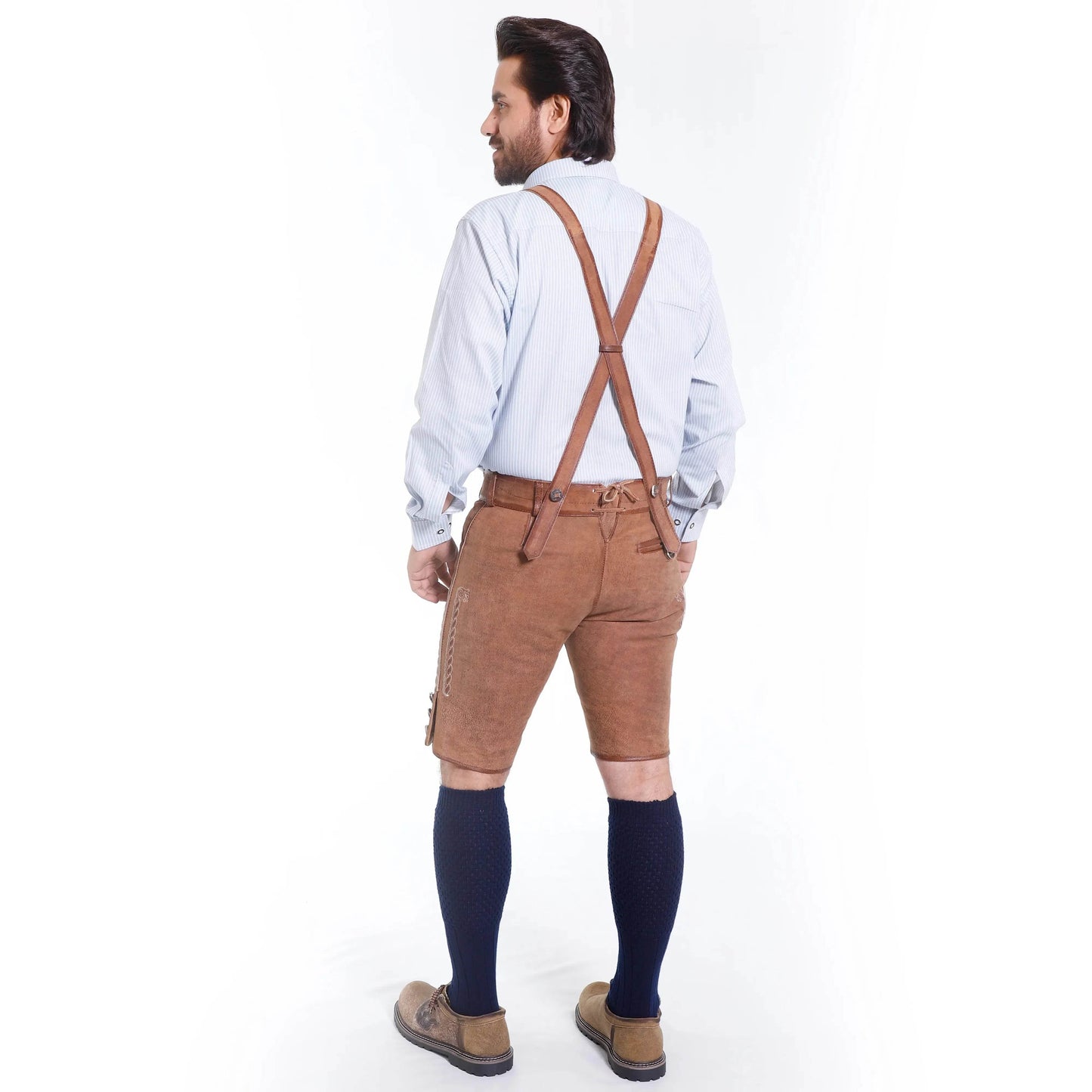 Back view of brown leather lederhosen with suspenders and embroidered leg patches