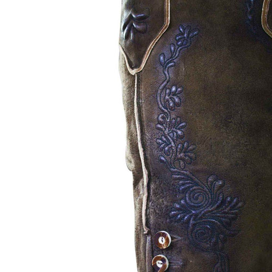 Brown lederhosen leg with dark blue floral embroidery and metal button detail