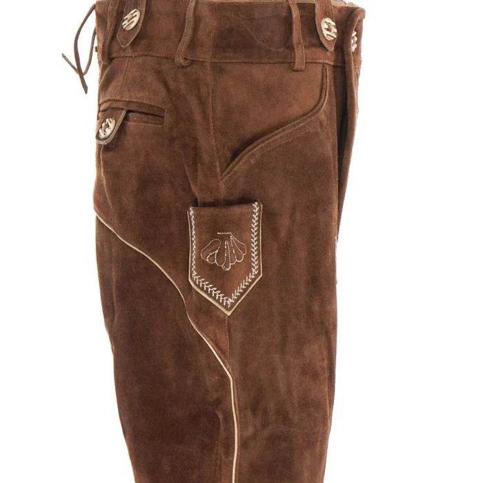 Dark brown suede lederhosen close-up with pocket flap, metal-look buttons, and stitched panel