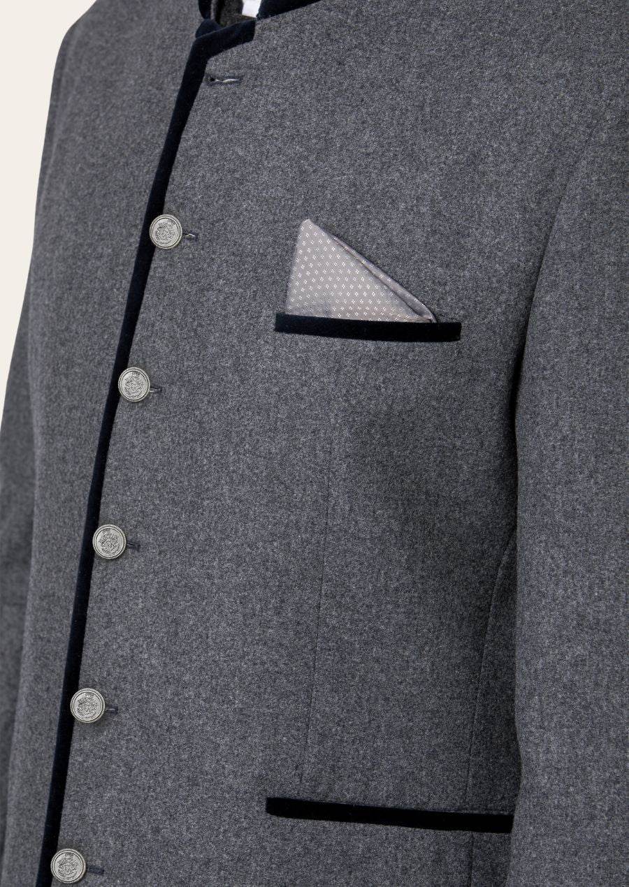 Men's alpine-style jacket close-up, gray fabric with silver buttons and pocket square
