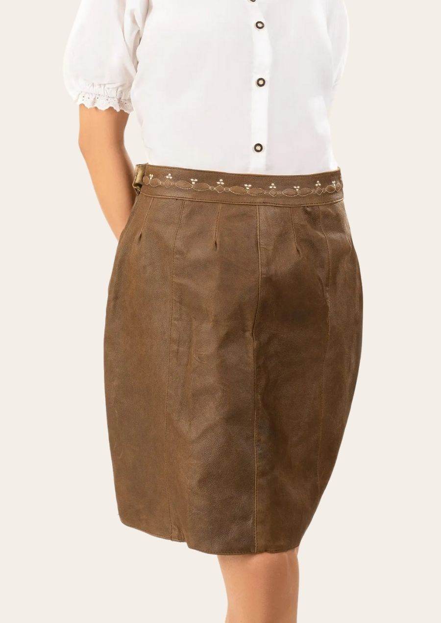 Women’s brown leather skirt with decorative waistband and front seam, pencil silhouette