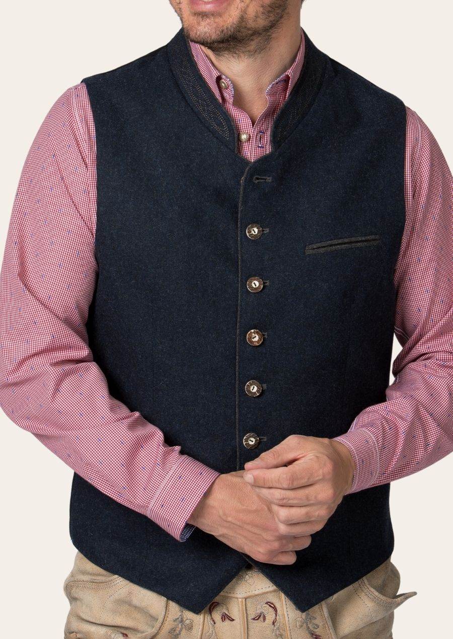 Men’s dark blue trachten waistcoat vest with V-neck, gold buttons, and chest pocket detail