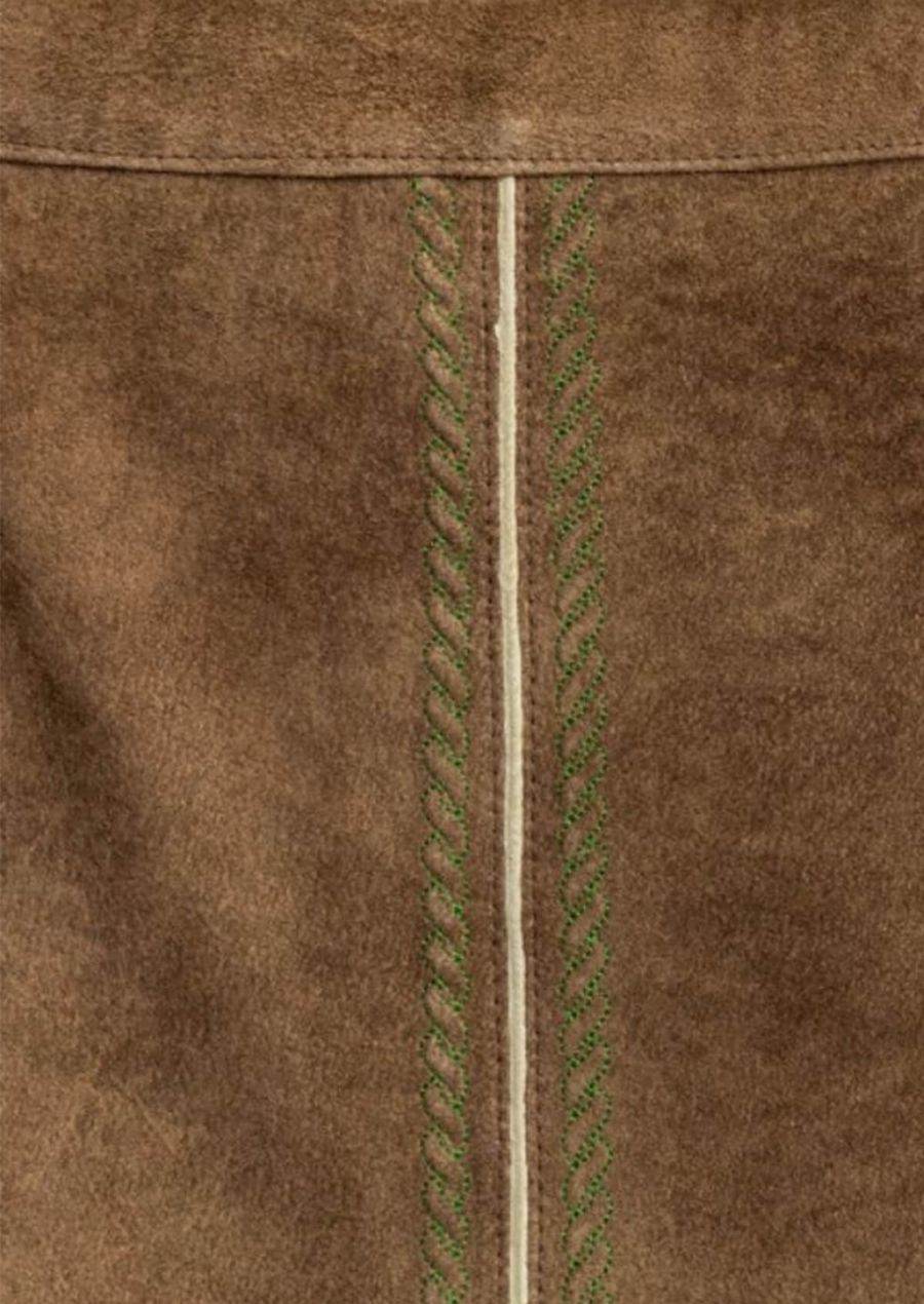 Leather-look skirt close-up: dark brown fabric with green braided trim along center seam
