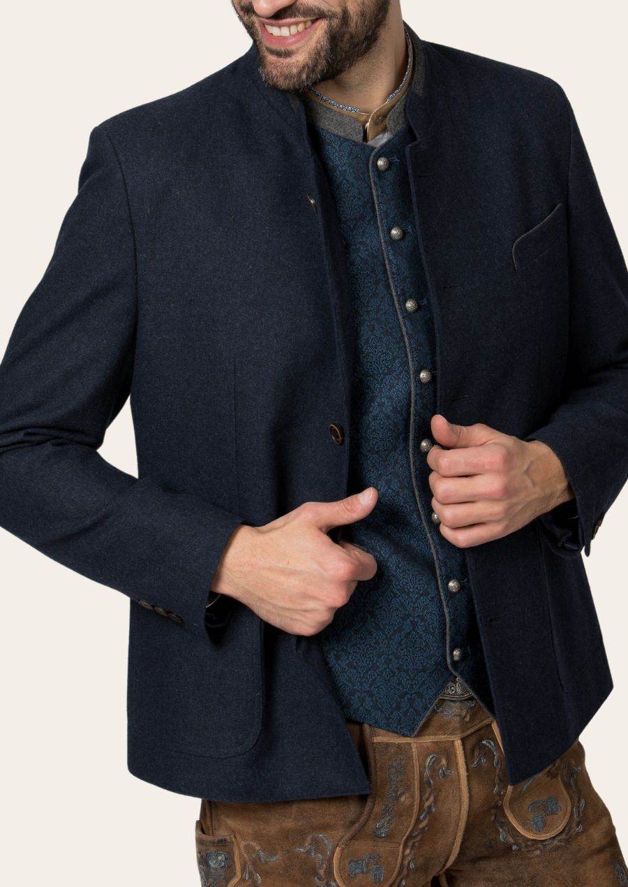 Men's traditional jacket close-up, dark navy blue with horn-style buttons and pocket flap