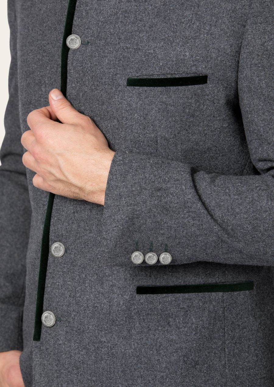 Gray jacket detail with green piping, silver buttons, and chest pocket trim