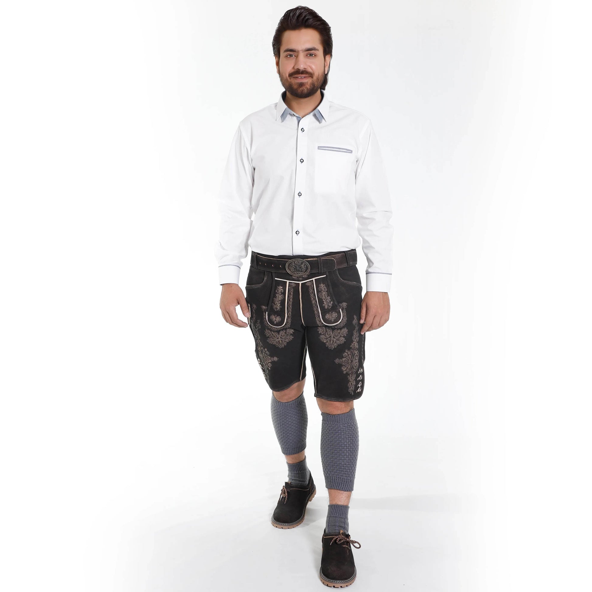 Men's dark lederhosen shorts with ornate panels, worn with a belt and socks.