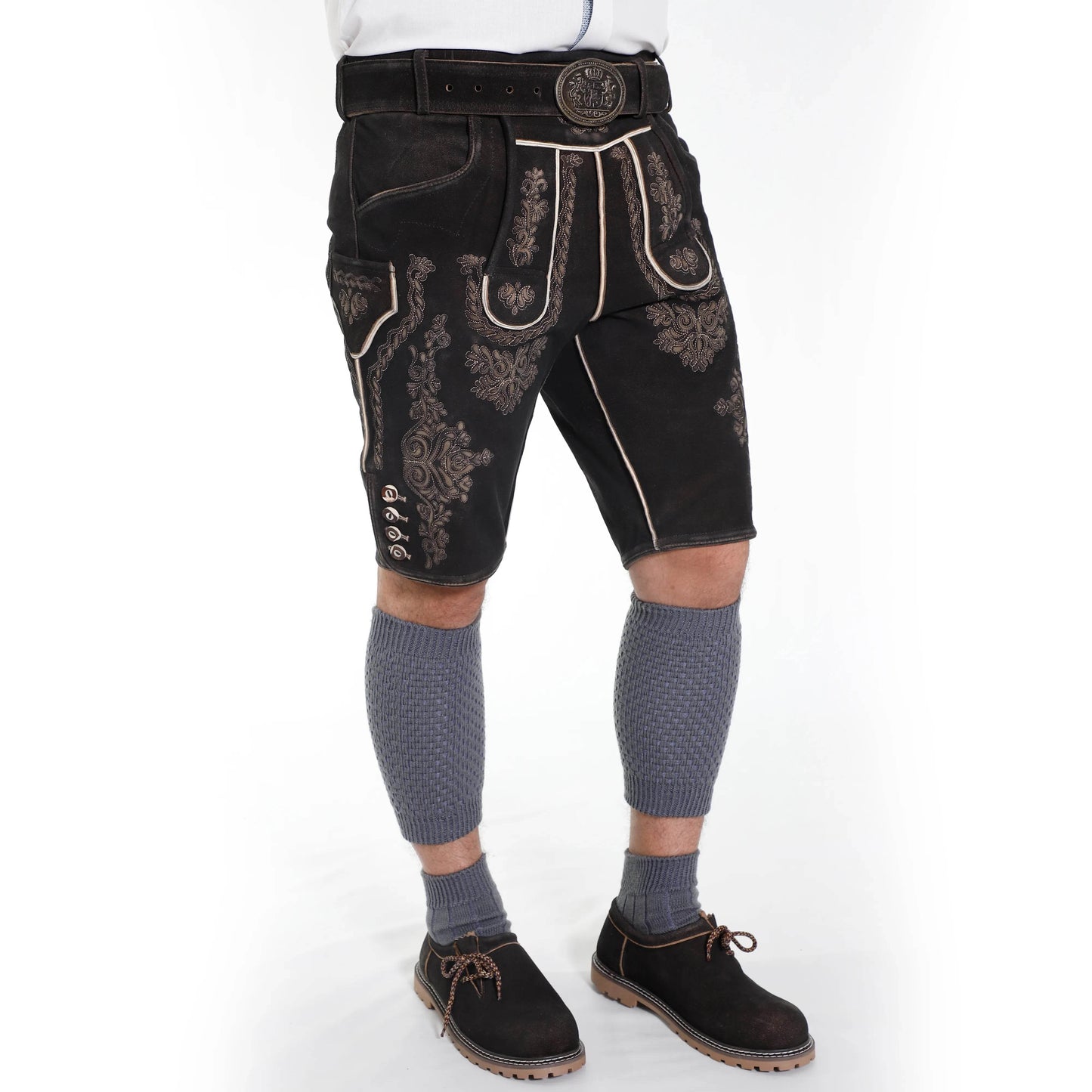 Men's dark suede lederhosen shorts with decorative panels and contrast trim, side view.