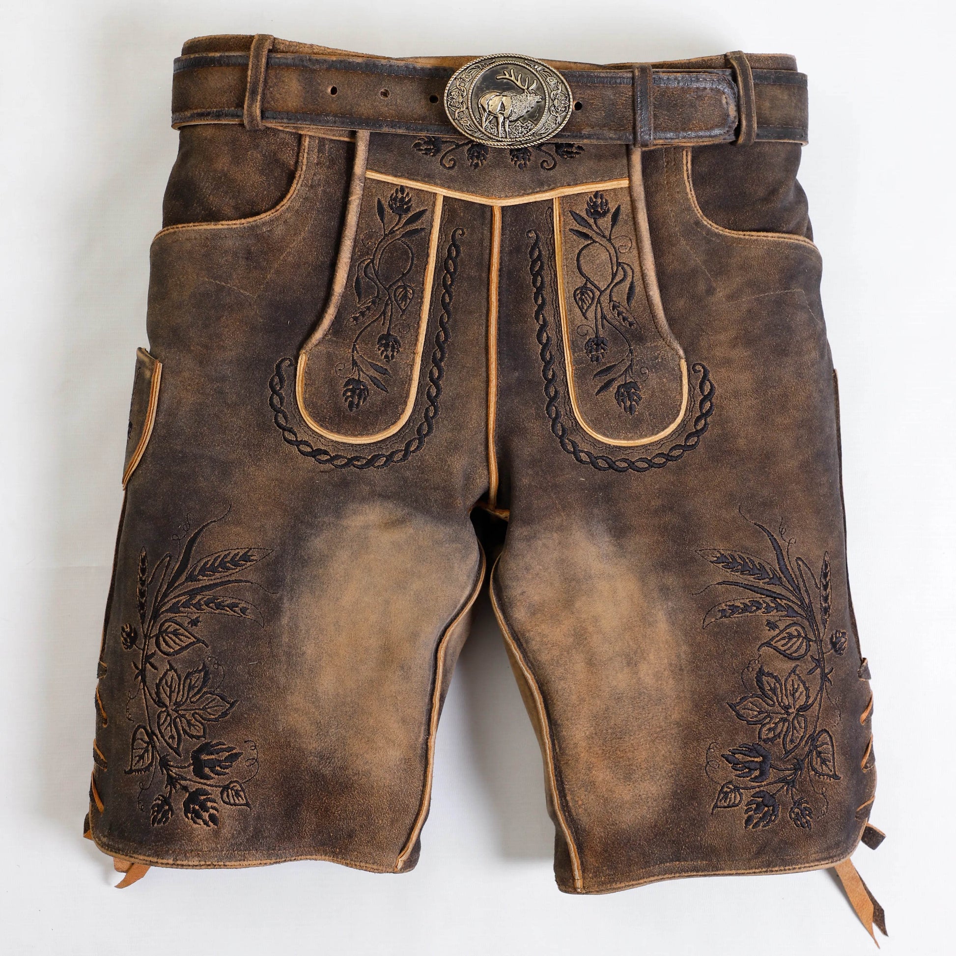Dark brown short leather lederhosen with decorative embroidery and front pocket panels
