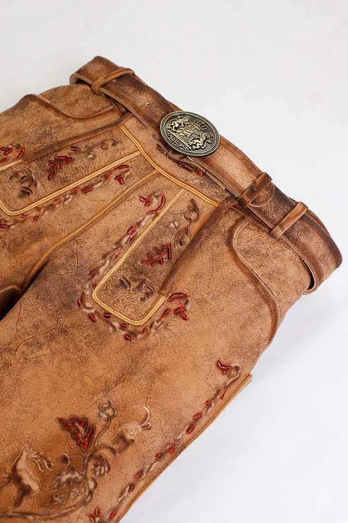 Men's brown leather lederhosen with embroidered front and strap buckle