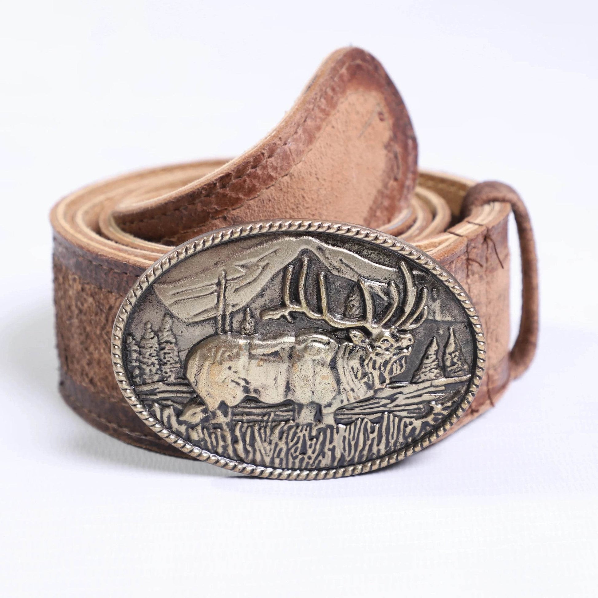 Men's brown leather belt with close-up oval engraved buckle and stitched keeper