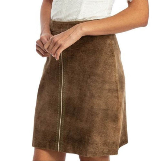 Women’s brown leather trachten skirt on model, straight A-line knee-length fit
