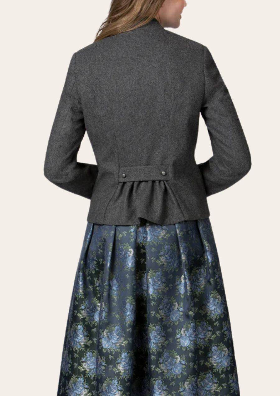 Back view of dark gray women’s traditional jacket with green belt and peplum hem