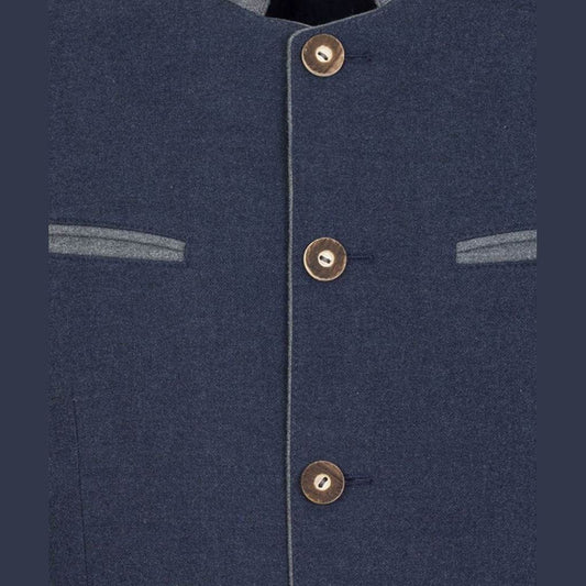 Navy blue overcoat front close-up with gold-tone button placket
