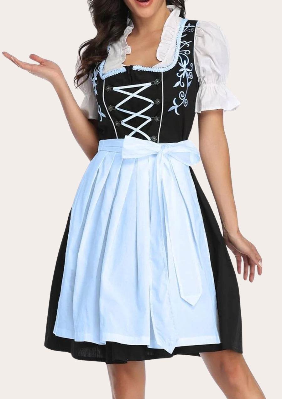 Dirndl dress front with black bodice, white crisscross lacing, light-blue pleated skirt