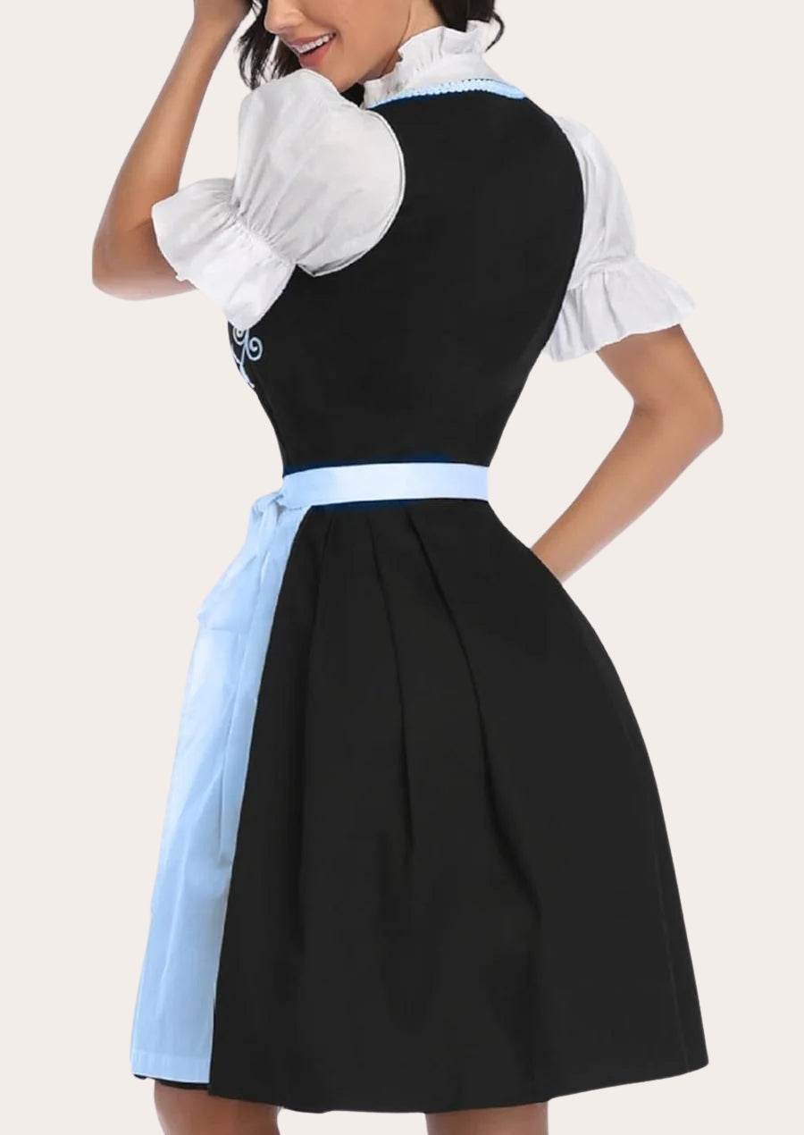 Dirndl dress side view with black skirt and light-blue panel at the waist